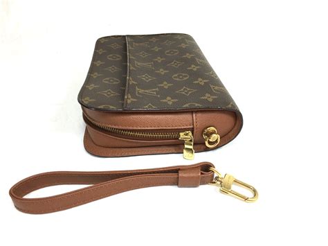 louis vuitton wristlet for sale.